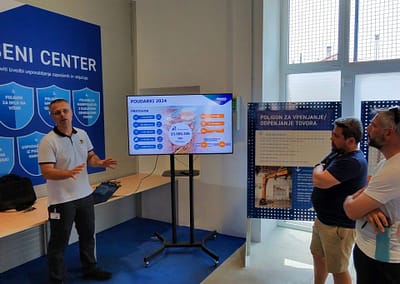 Interior view of a modern training center with spacious, well-lit rooms equipped for educational and collaborative activities.