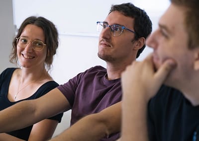 Participants working on laptops during an Inno2MARE IT Bootcamp session, focused on digital skills and innovation training.